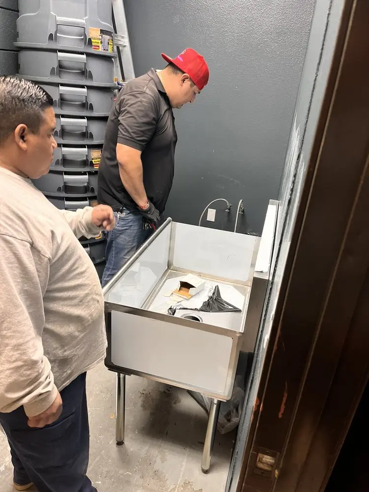 Commercial plumbing and sink installation in Oakville
